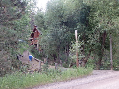 GDMBR: A nice home with a brook crossing.